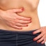 woman suffering from stomach bloating pain in San Antonio TX