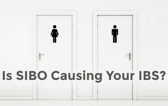 Is SIBO causing your IBS caption with bathroom door background