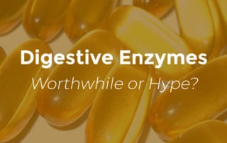 digestive enzymes worth while or hype with gold colored pills background