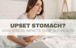 how stress impacts digestive health with woman holding stomach