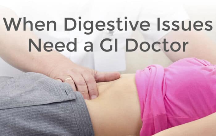 when digestive issues need a GI doctor with woman getting stomach evaluated by doctor